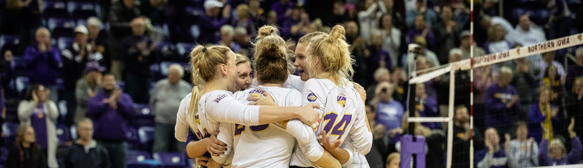 Panther volleyball players on the court